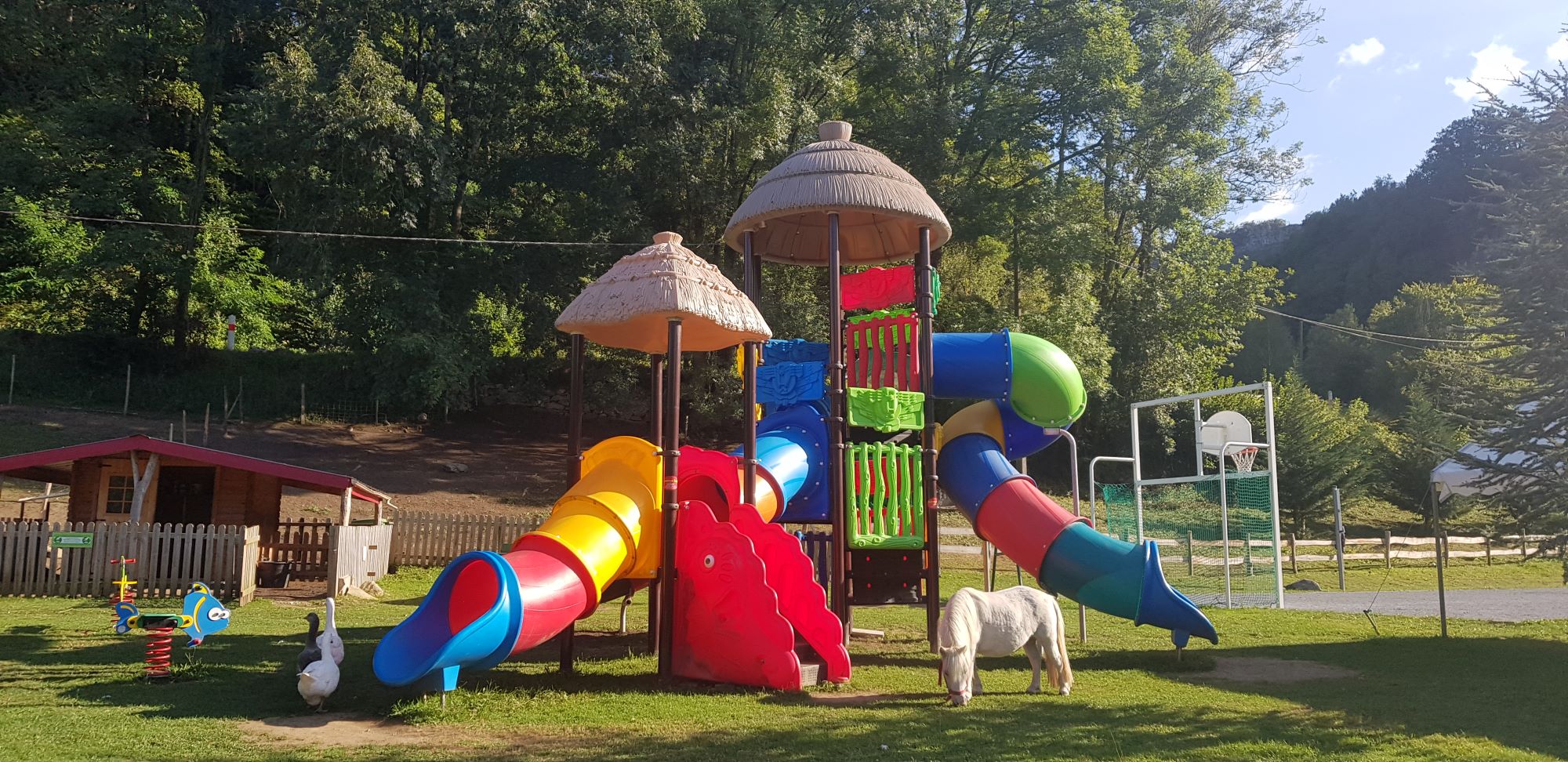 Play area for children at Camping la Forêt